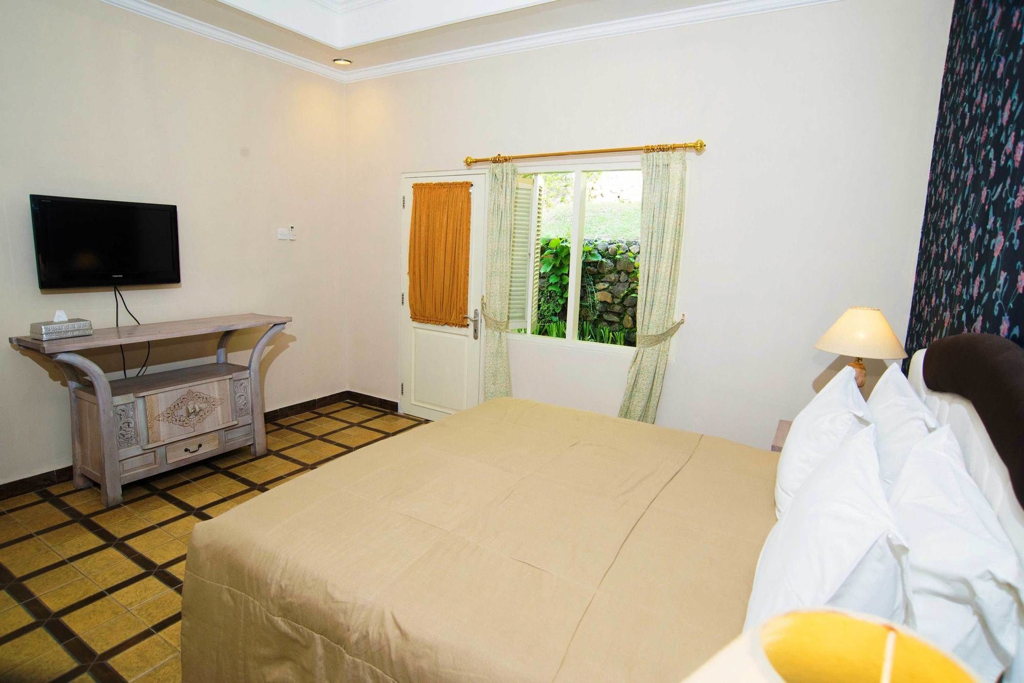 Sendok Hotel Mangsit Εξωτερικό φωτογραφία
